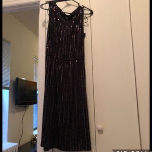 Black dress with glitter stripes detail